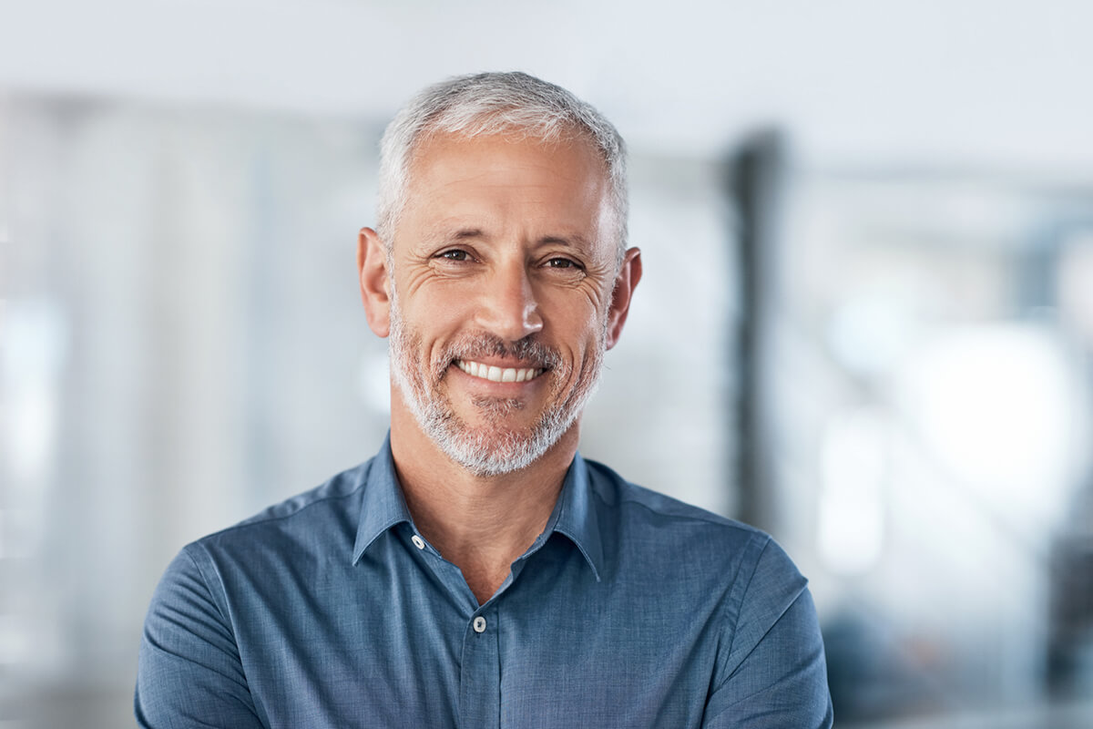 Implant-Supported Dentures: A Stable Alternative to Traditional Dentures
