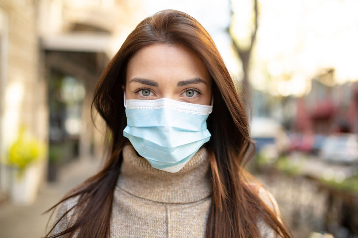 a woman wearing a mask